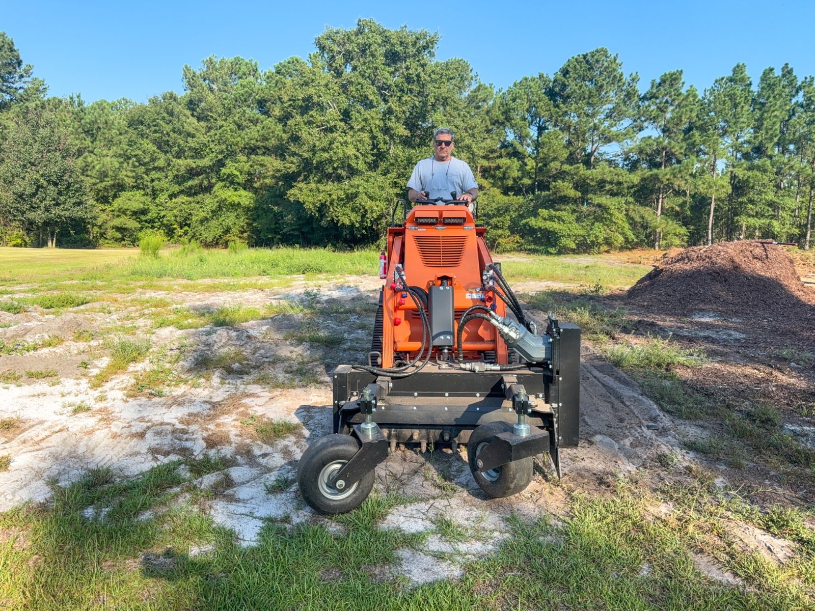 Hydraulic Harley rake used for ground preparation and light grading